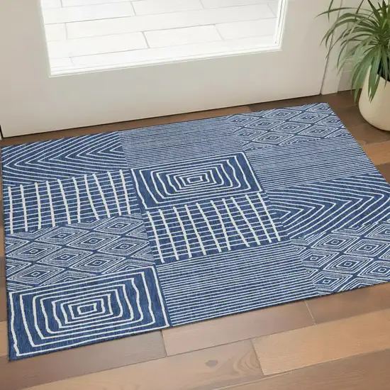Navy Blue And Ivory Geometric Washable Area Rug With UV Protection Photo 1