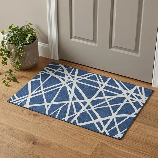 Navy Blue And Ivory Geometric Washable Area Rug With UV Protection Photo 1
