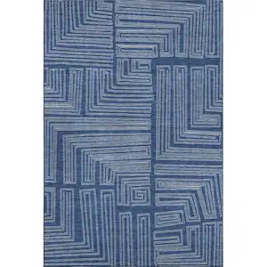 Photo of Navy Blue And Ivory Geometric Washable Area Rug With UV Protection