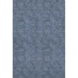 Photo of Navy Blue And Ivory Geometric Washable Area Rug With UV Protection