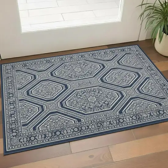 Navy Blue And Ivory Geometric Washable Area Rug With UV Protection Photo 2