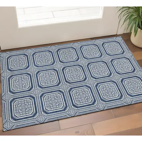 Navy Blue And Ivory Geometric Washable Area Rug With UV Protection Photo 1