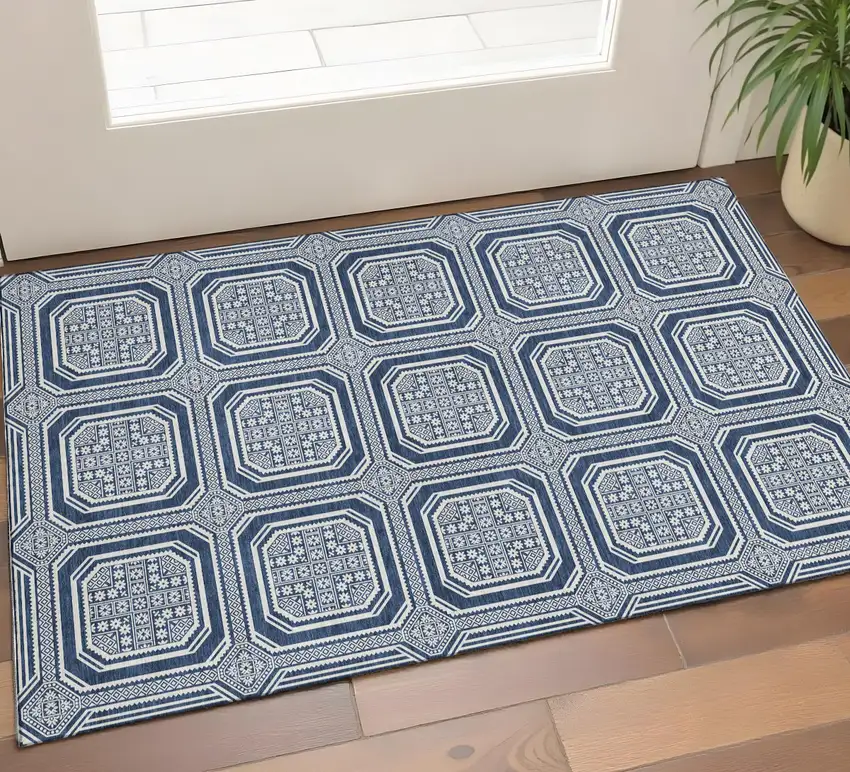 Navy Blue And Ivory Geometric Washable Area Rug With UV Protection Photo 1