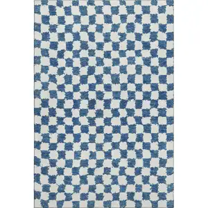 Photo of Navy Blue And Ivory Geometric Washable Area Rug With UV Protection