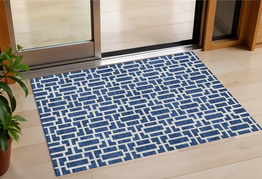 Navy Blue And Ivory Geometric Washable Indoor Outdoor Area Rug Photo 1