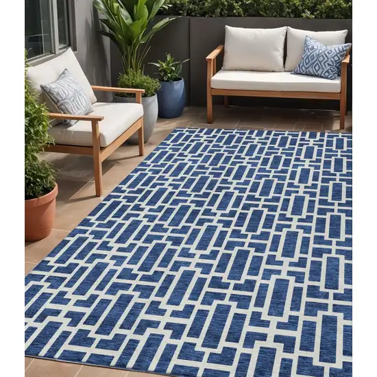 Navy Blue And Ivory Geometric Washable Indoor Outdoor Area Rug Photo 1