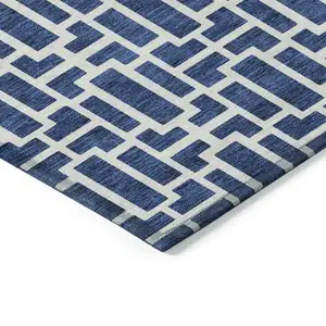 Photo of Navy Blue And Ivory Geometric Washable Indoor Outdoor Area Rug
