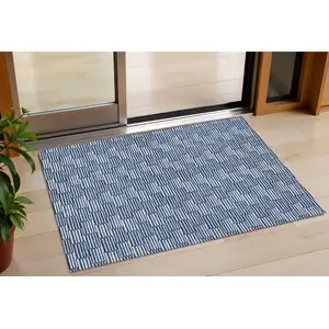 Photo of Navy Blue And Ivory Geometric Washable Indoor Outdoor Area Rug