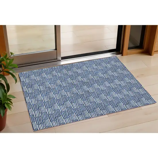 Navy Blue And Ivory Geometric Washable Indoor Outdoor Area Rug Photo 1