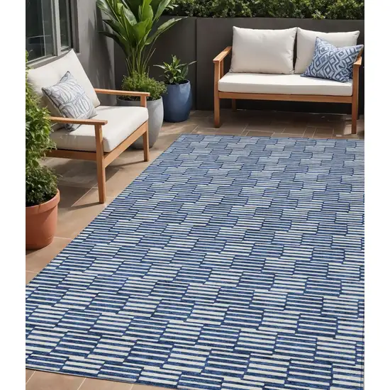 Navy Blue And Ivory Geometric Washable Indoor Outdoor Area Rug Photo 1