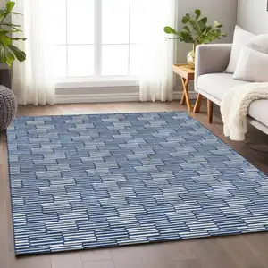 Photo of Navy Blue And Ivory Geometric Washable Indoor Outdoor Area Rug