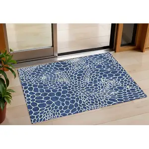 Photo of Navy Blue And Ivory Geometric Washable Indoor Outdoor Area Rug