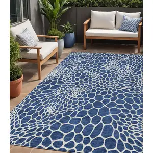 Photo of Navy Blue And Ivory Geometric Washable Indoor Outdoor Area Rug