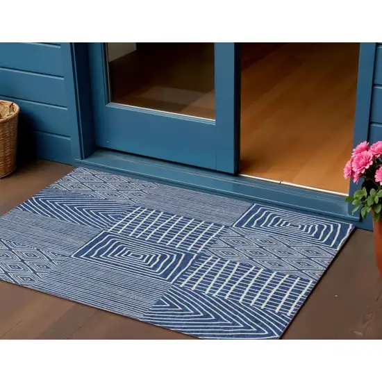 Navy Blue And Ivory Geometric Washable Indoor Outdoor Area Rug Photo 1