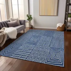 Photo of Navy Blue And Ivory Geometric Washable Indoor Outdoor Area Rug