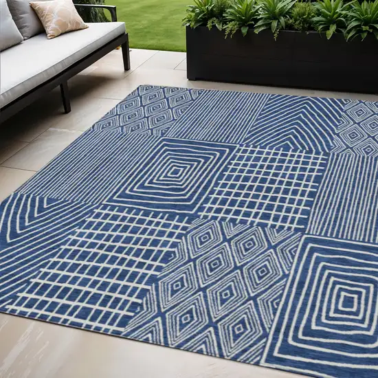 Navy Blue And Ivory Geometric Washable Indoor Outdoor Area Rug Photo 1