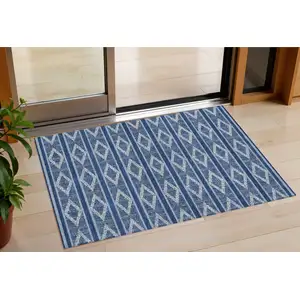 Photo of Navy Blue And Ivory Geometric Washable Indoor Outdoor Area Rug