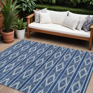 Photo of Navy Blue And Ivory Geometric Washable Indoor Outdoor Area Rug