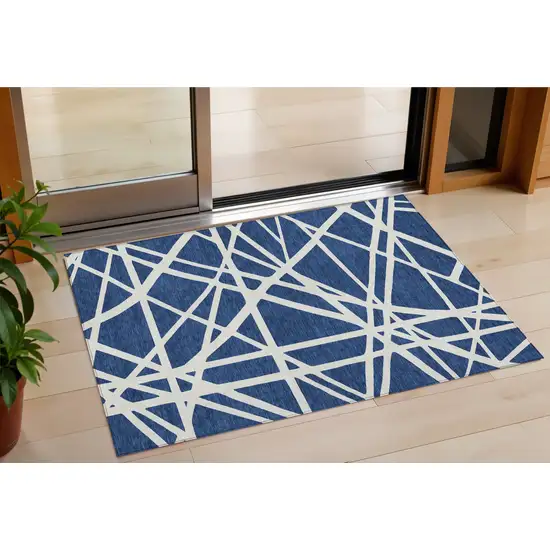 Navy Blue And Ivory Geometric Washable Indoor Outdoor Area Rug Photo 1