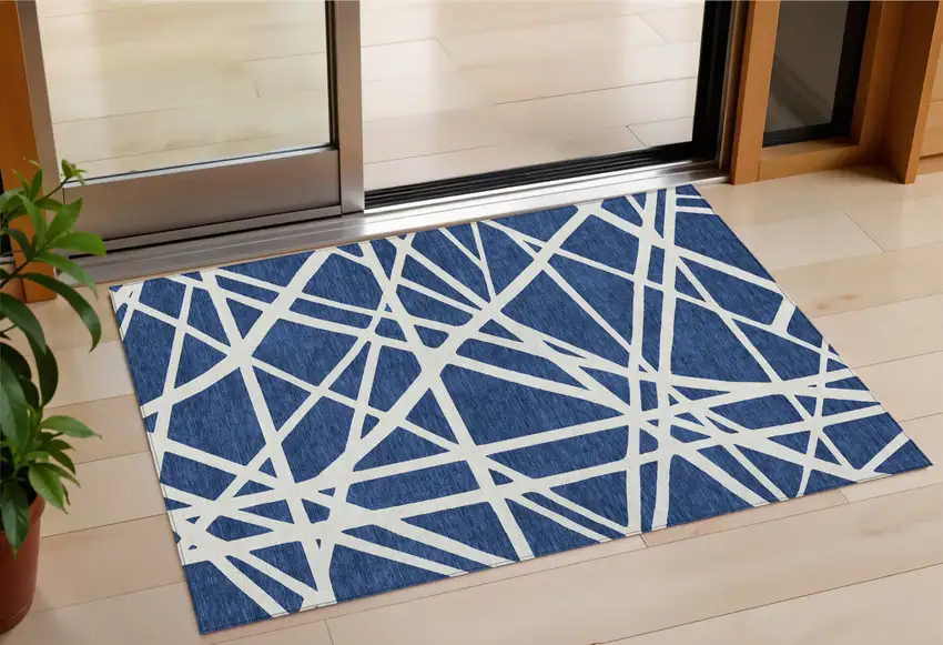 Navy Blue And Ivory Geometric Washable Indoor Outdoor Area Rug Photo 1