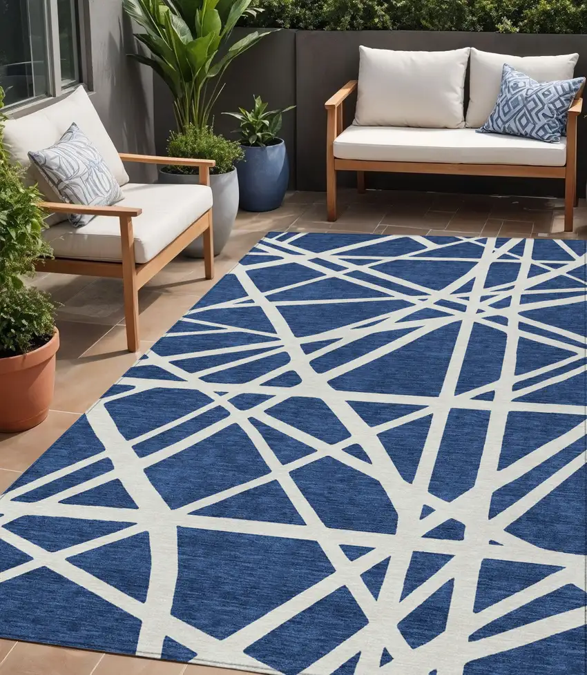 Navy Blue And Ivory Geometric Washable Indoor Outdoor Area Rug Photo 1