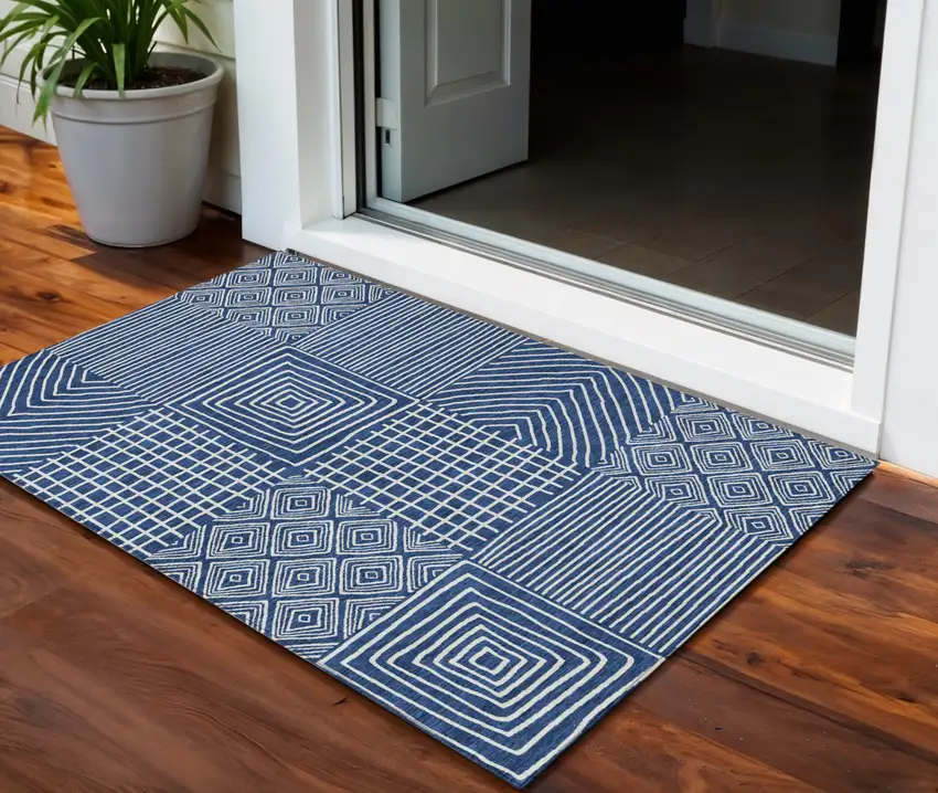 Navy Blue And Ivory Geometric Washable Indoor Outdoor Area Rug Photo 1