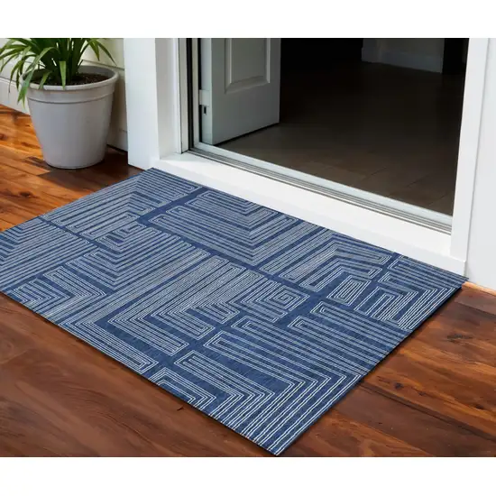 Navy Blue And Ivory Geometric Washable Indoor Outdoor Area Rug Photo 1