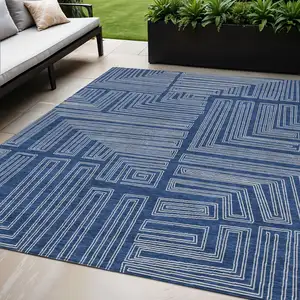 Photo of Navy Blue And Ivory Geometric Washable Indoor Outdoor Area Rug