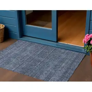 Photo of Navy Blue And Ivory Geometric Washable Indoor Outdoor Area Rug