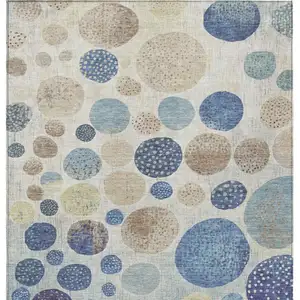 Photo of Navy Blue And Ivory Geometric Washable Indoor Outdoor Area Rug