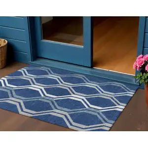 Photo of Navy Blue And Ivory Geometric Washable Indoor Outdoor Area Rug