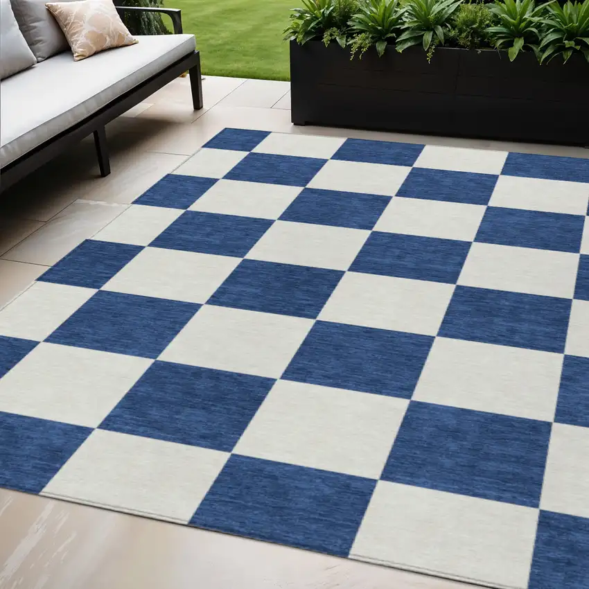 Navy Blue And Ivory Geometric Washable Indoor Outdoor Area Rug Photo 1