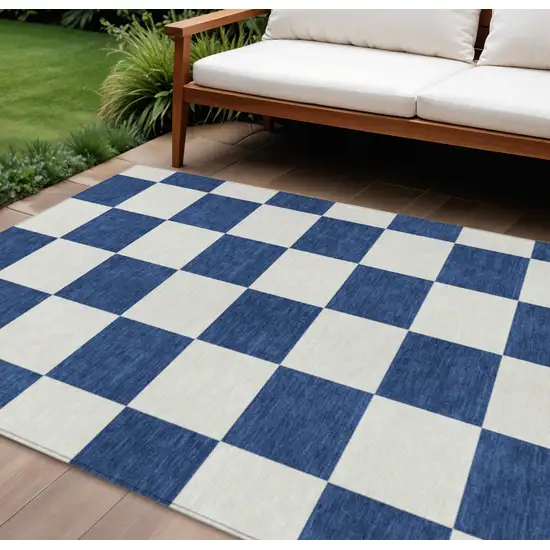 Navy Blue And Ivory Geometric Washable Indoor Outdoor Area Rug Photo 1