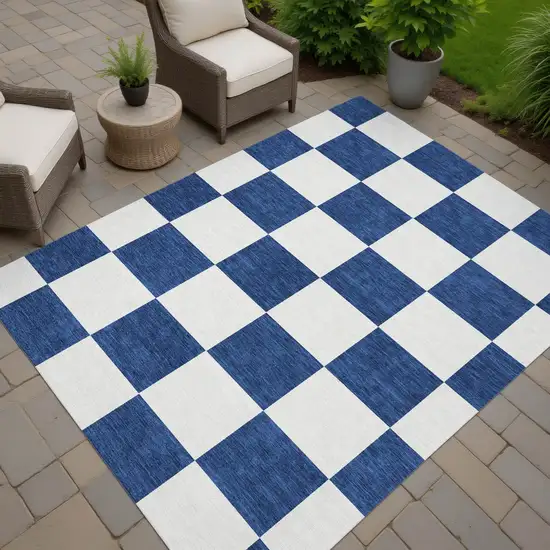 Navy Blue And Ivory Geometric Washable Indoor Outdoor Area Rug Photo 6