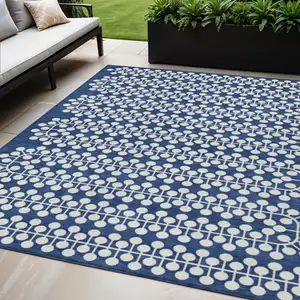 Photo of Navy Blue And Ivory Geometric Washable Indoor Outdoor Area Rug