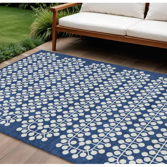 Navy Blue And Ivory Geometric Washable Indoor Outdoor Area Rug Photo 1