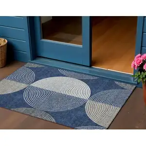 Photo of Navy Blue And Ivory Geometric Washable Indoor Outdoor Area Rug
