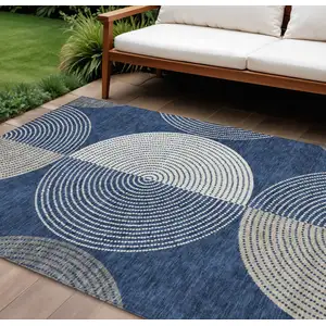 Photo of Navy Blue And Ivory Geometric Washable Indoor Outdoor Area Rug