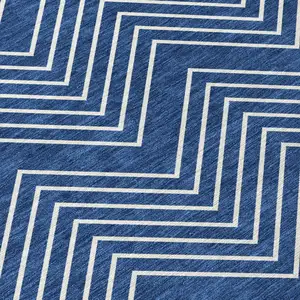 Photo of Navy Blue And Ivory Geometric Washable Indoor Outdoor Area Rug