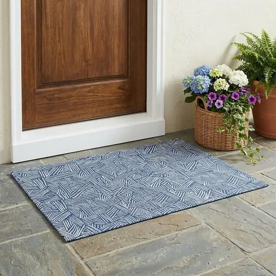 Navy Blue And Ivory Geometric Washable Indoor Outdoor Area Rug Photo 1