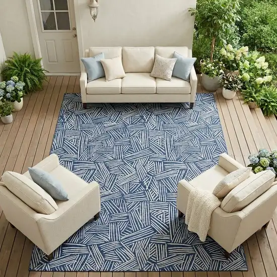 Navy Blue And Ivory Geometric Washable Indoor Outdoor Area Rug Photo 1