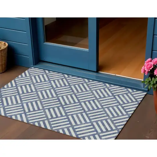 Navy Blue And Ivory Geometric Washable Indoor Outdoor Area Rug Photo 1