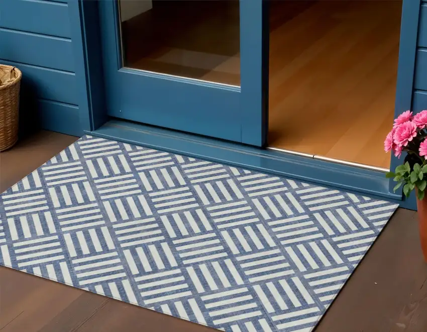 Navy Blue And Ivory Geometric Washable Indoor Outdoor Area Rug Photo 1
