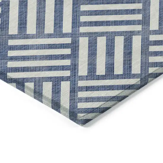 Navy Blue And Ivory Geometric Washable Indoor Outdoor Area Rug Photo 4