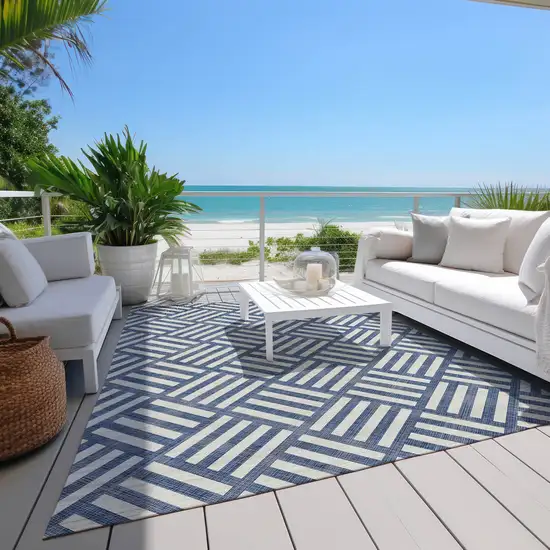Navy Blue And Ivory Geometric Washable Indoor Outdoor Area Rug Photo 7