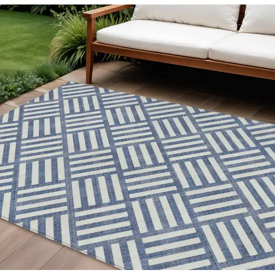 Navy Blue And Ivory Geometric Washable Indoor Outdoor Area Rug Photo 1