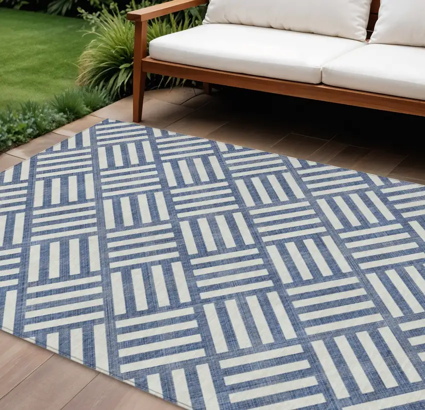 Navy Blue And Ivory Geometric Washable Indoor Outdoor Area Rug Photo 1