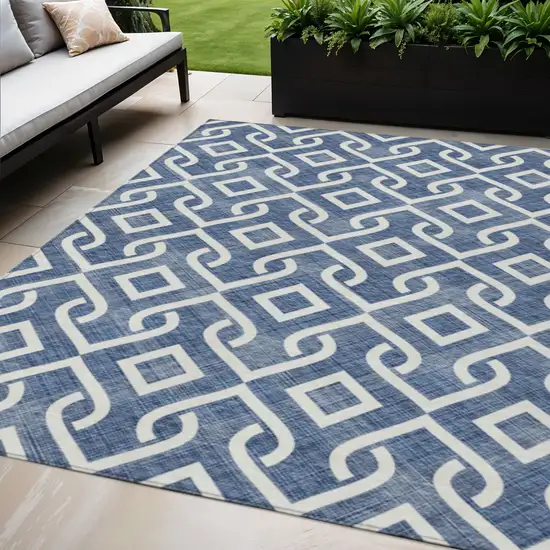 Navy Blue And Ivory Geometric Washable Indoor Outdoor Area Rug Photo 1