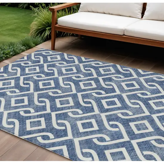 Navy Blue And Ivory Geometric Washable Indoor Outdoor Area Rug Photo 1