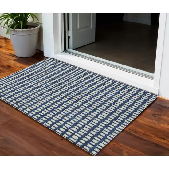 Navy Blue And Ivory Geometric Washable Indoor Outdoor Area Rug Photo 1